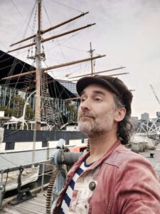 Michael Chalk in costume as a 19th century sailor, working Polly Woodside for National Trust (NTAV)